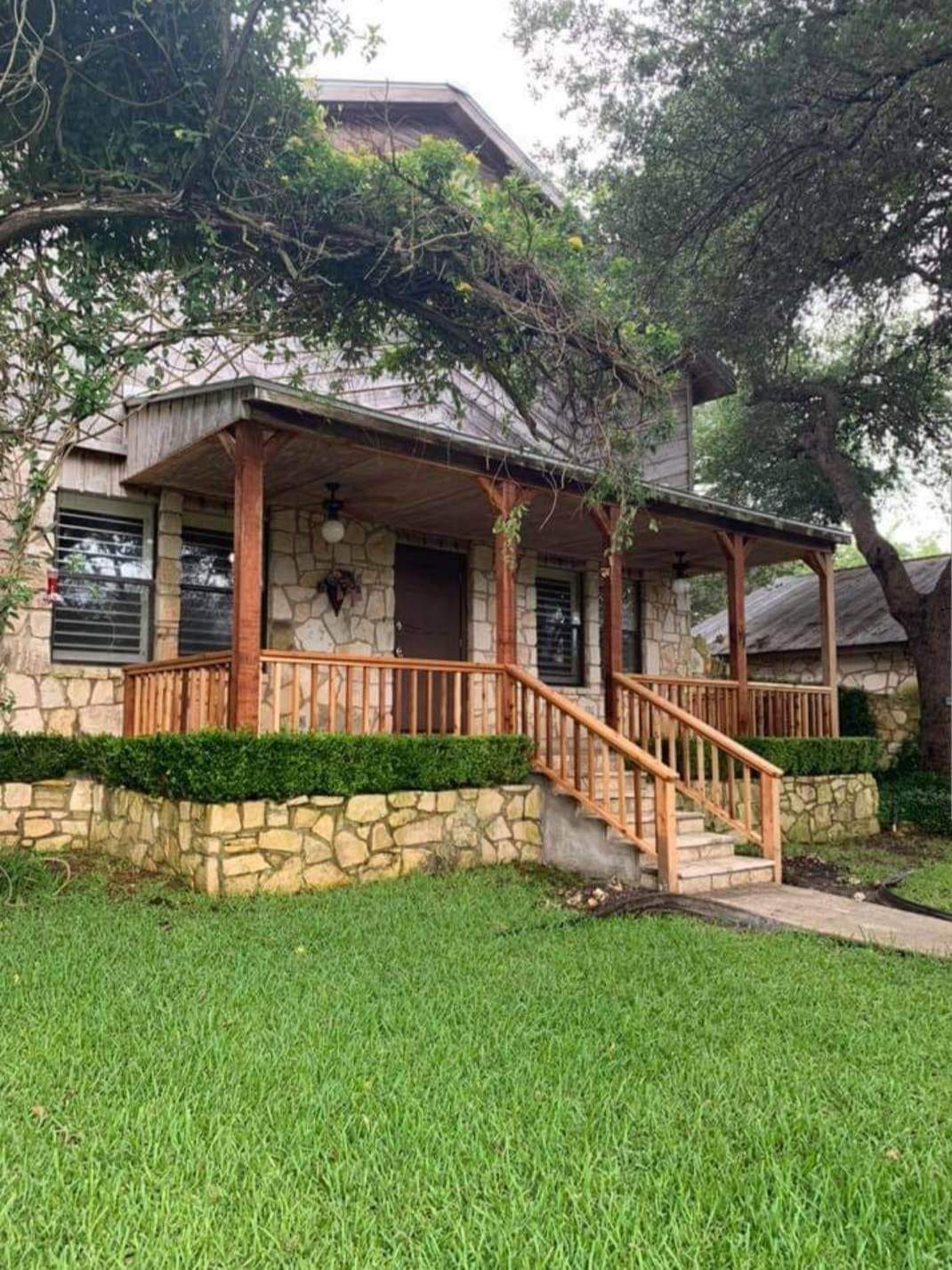 Privacy fence installation with cedar boards by Against the Grain Woodworks