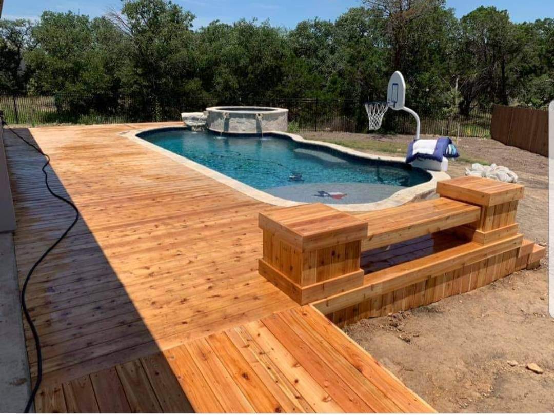 Wooden arbor entryway with custom post detailing by Against the Grain Woodworks