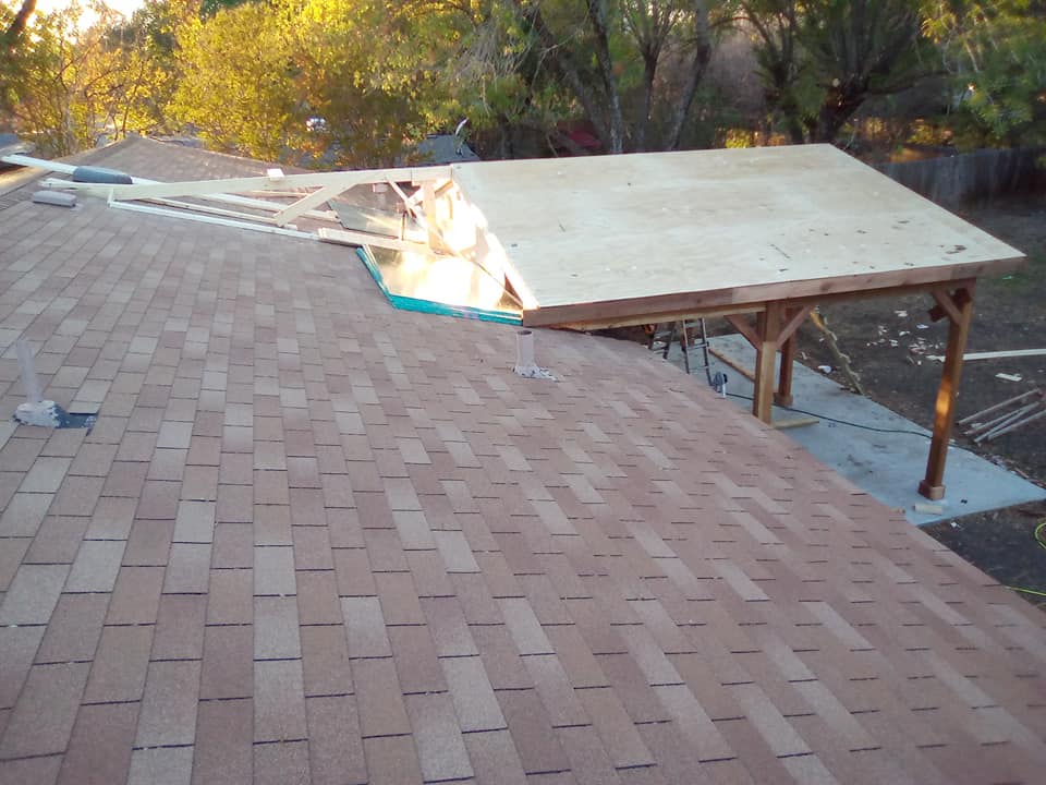 Custom deck build with treated lumber and stair access by Against the Grain Woodworks