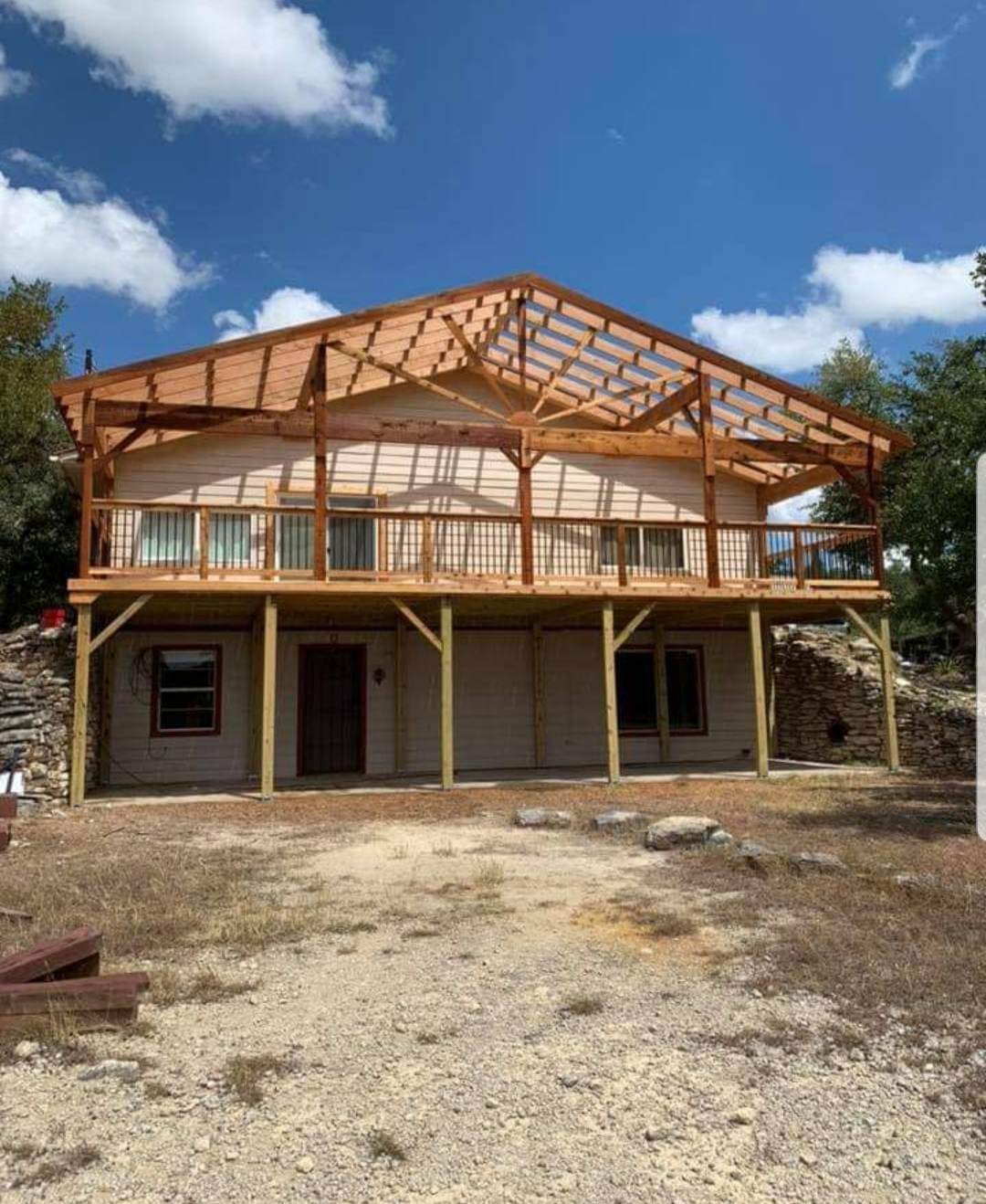 Custom man cave interior woodwork and shelving by Against the Grain Woodworks